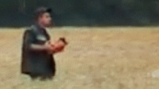 Watch This Guy Haul Off One Of MH17's Black Boxes
